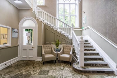 Interior view of a stairwell and seating area