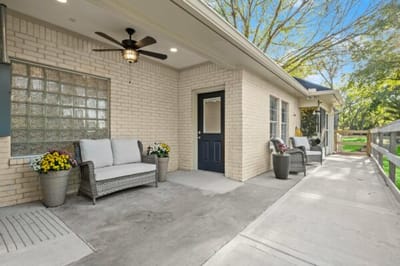 Outdoor seating area with comfortable furniture.