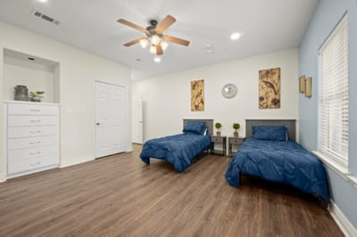 Two beds in a shared resident room.