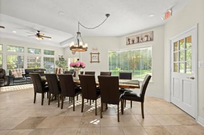 Dining area with large table and natural light
