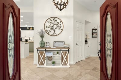 Welcoming interior entryway with decor and furnishings