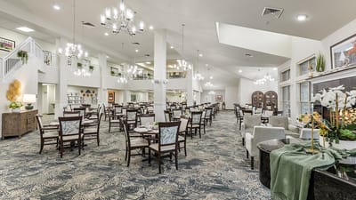 Dining area with elegant decor and seating.
