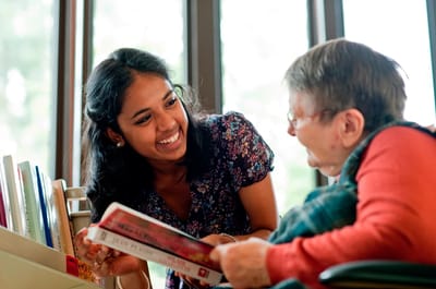 Staff member engaging with a resident
