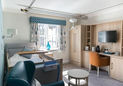 Modern assisted living resident room with natural light