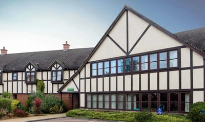 Exterior view of a nursing home facility.