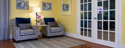 Cozy common area with armchairs and decor