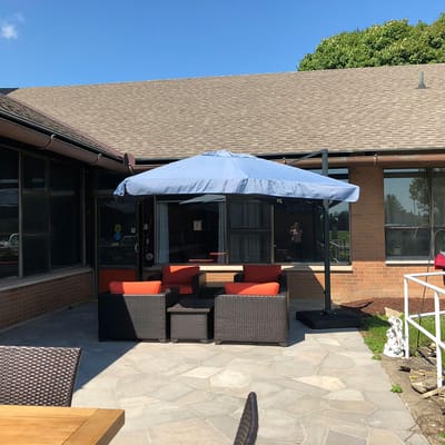 Outdoor seating area with umbrellas and chairs
