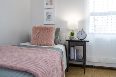 Cozy resident room with decorative elements.