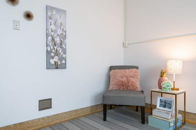 Cozy interior seating area with decor.