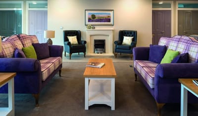 Comfortable lounge area with seating and decor.
