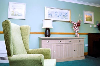 Cozy interior seating area with decor.