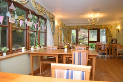 Bright common area with tables and decorations