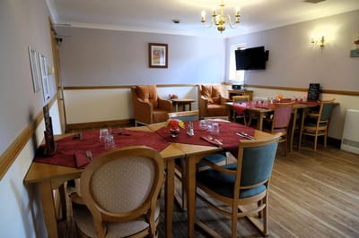 Dining area with tables set for meals