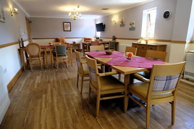 Welcoming common area with tables and chairs