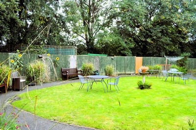 Outdoor garden area with seating