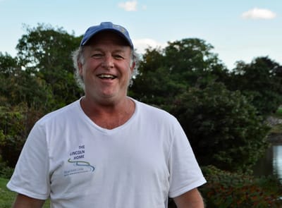 Smiling man outdoors at The Lincoln Home.