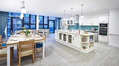 Bright dining area with modern kitchen