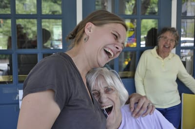 Staff and residents sharing joyful moments