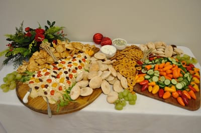 A beautifully arranged food display with snacks.