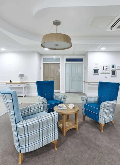 Cozy seating area with chairs and coffee table