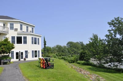 Exterior view of the facility with outdoor seating