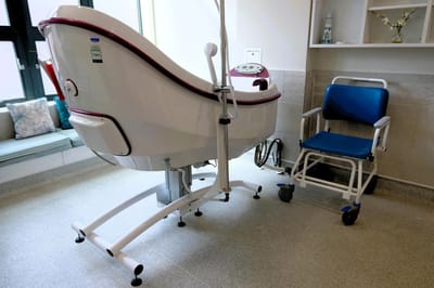 Bathing equipment in a modern facility room.