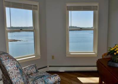 Cozy interior view with a scenic waterfront