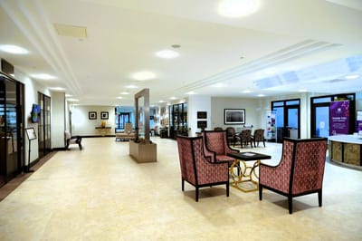 Bright common area with seating in the facility.