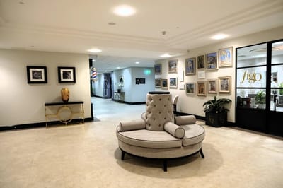 Cozy lobby area with art and modern furniture.