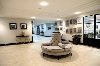 Spacious lobby area with artwork and seating