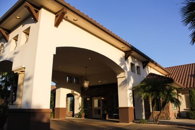 Exterior view of Cedarbrook Memory Care Community entrance