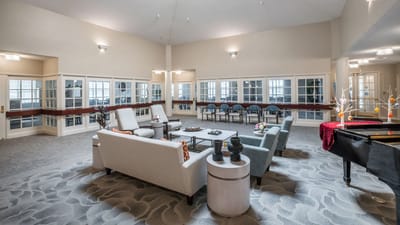 Common area with seating and large windows