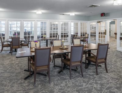 Bright interior dining area with tables and chairs