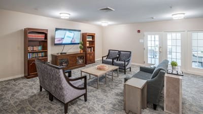 A common area with seating and a television
