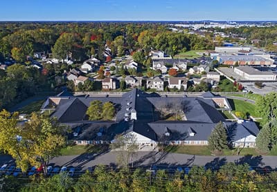 Aerial view of the American House Livonia facility surrounded by residential areas