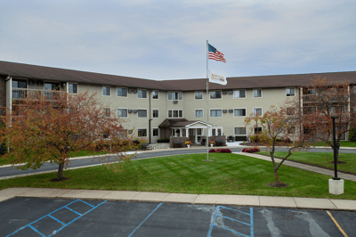 Exterior view of the facility with landscaping