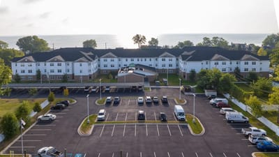 Aerial view of American House Lakeshore facility and parking lot.
