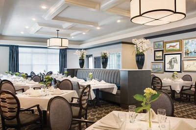 Elegant dining room setup with tables and decor