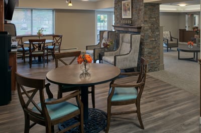 Common area with comfortable seating and a table