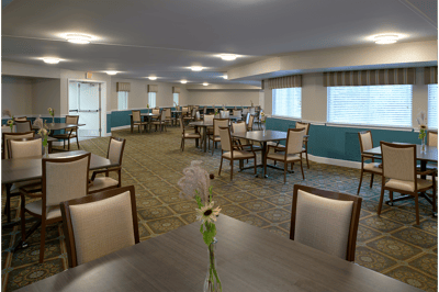 Dining area with tables and flower centerpieces