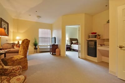 Cozy interior of a resident room with furniture