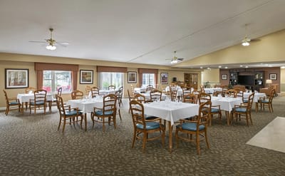 Bright dining room with neatly set tables