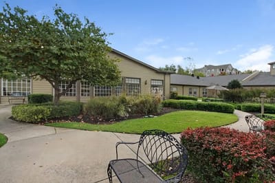 Outdoor garden area with walking paths and seating