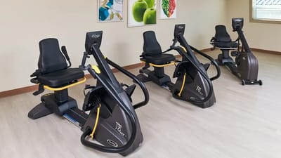 Exercise equipment in a senior living facility gym