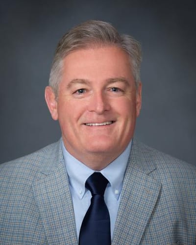 Professional portrait of a man in a suit