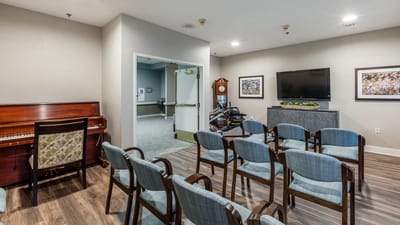Interior common area with chairs and piano