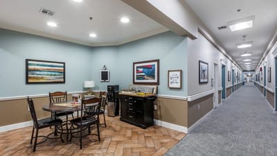 Interior view of a hallway with seating area