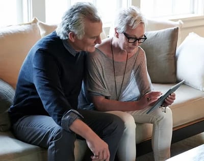 Couple engaged in a conversation on a couch
