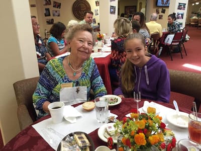 Residents enjoying a meal together in a dining area