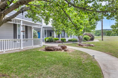 Exterior view of a well-maintained garden at the facility